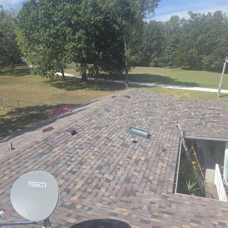 Owen's Corning roof shingles with skylight and vents
