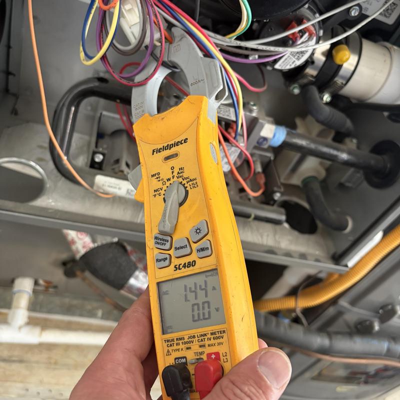 Furnace electrical wiring voltage testing with clamp meter Furnace electrical wiring voltage testing with clamp meter