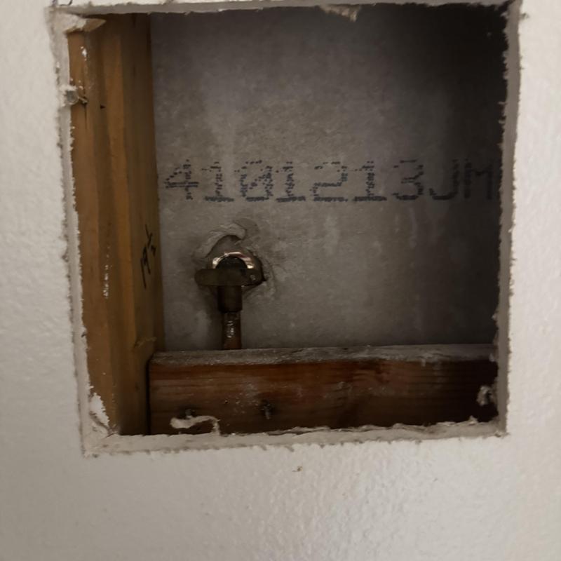 Shower arm plumbing valve inside wall access hole Shower arm plumbing valve inside wall access hole