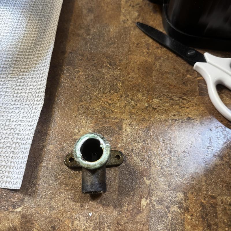 In-wall shower arm drop-ear fitting removed In-wall shower arm drop-ear fitting removed