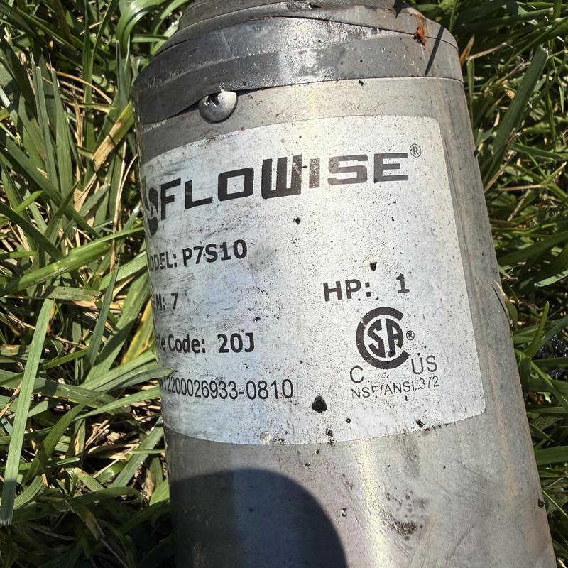 Well pump motor label on outdoor plumbing unit