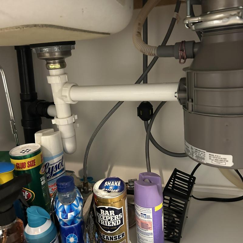 Sink drain plumbing under kitchen sink with disposal unit Sink drain plumbing under kitchen sink with disposal unit