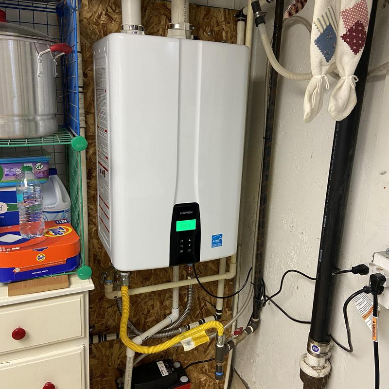 Tankless water heater with new gas and water lines Tankless water heater with new gas and water lines