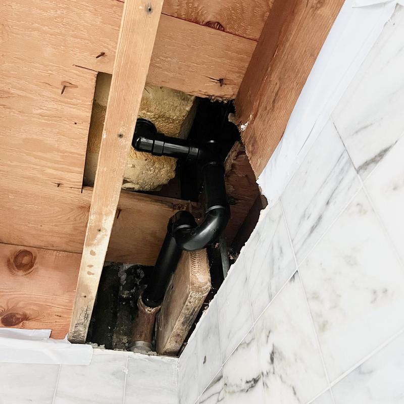 Tub shower drainage system with new P-trap installation Tub shower drainage system with new P-trap installation