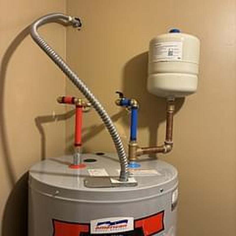 Electric water heater with expansion tank installation