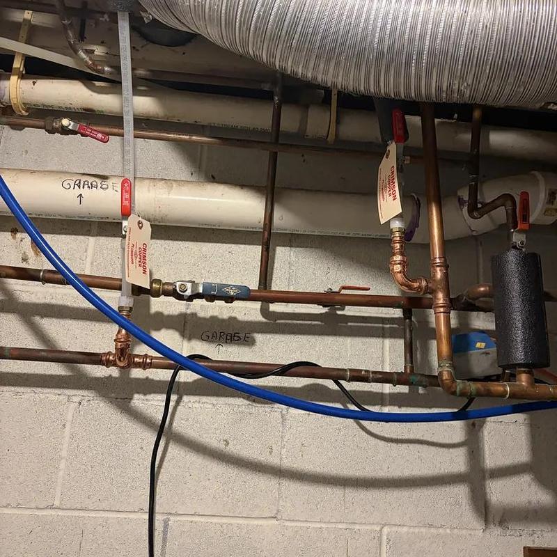 Copper plumbing pipes roughed in for garage heating