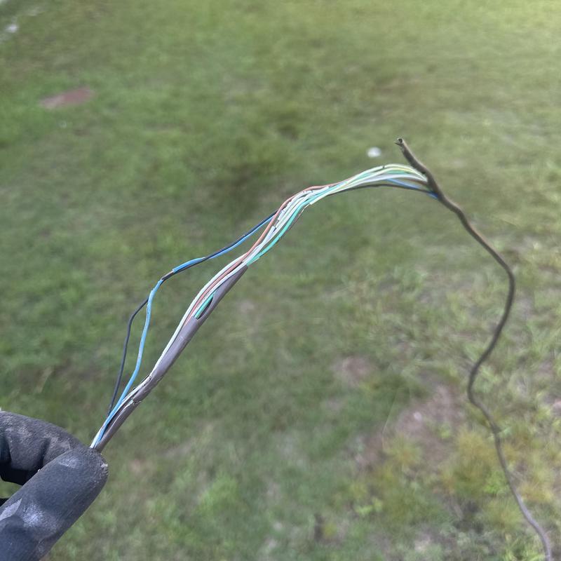 Thermostat wiring with damaged insulation outdoors Thermostat wiring with damaged insulation outdoors