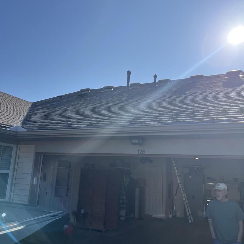 Roof shingles leak detection with vent pipes in sunlight Roof shingles leak detection with vent pipes in sunlight