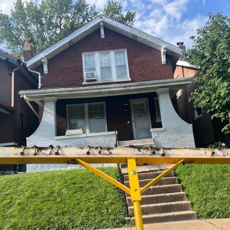 Owens Corning Duration shingles roof with new gutters