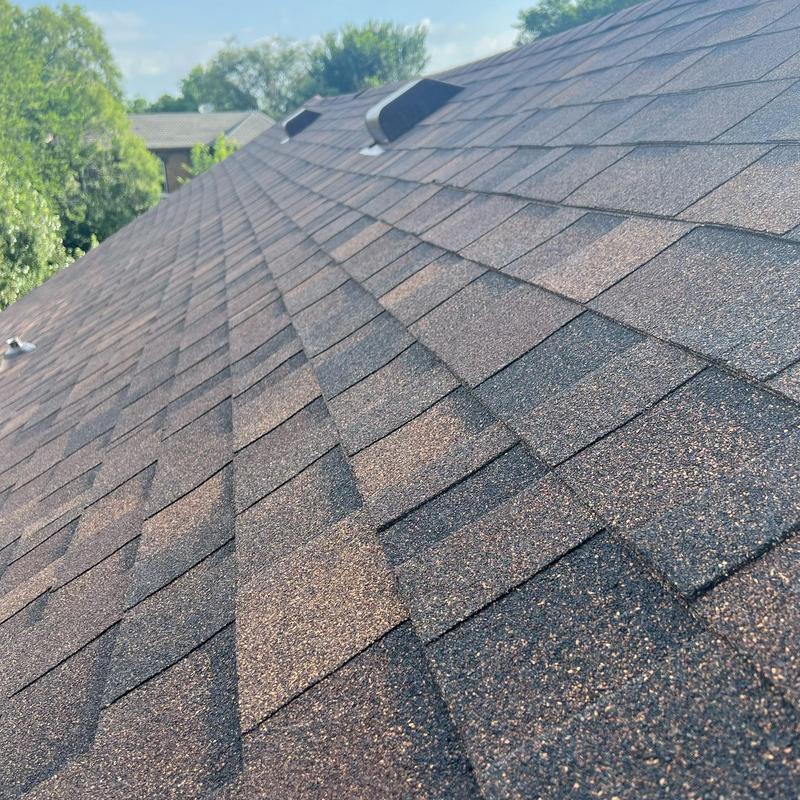 Owens Corning Duration Brownwood roof shingles close-up
