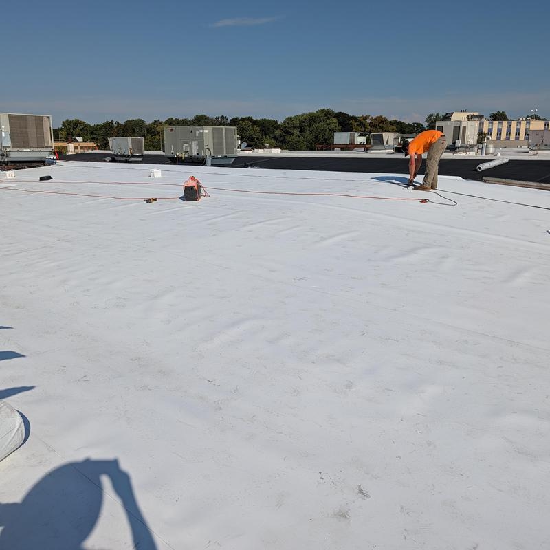 Commercial flat roof membrane during restoration work