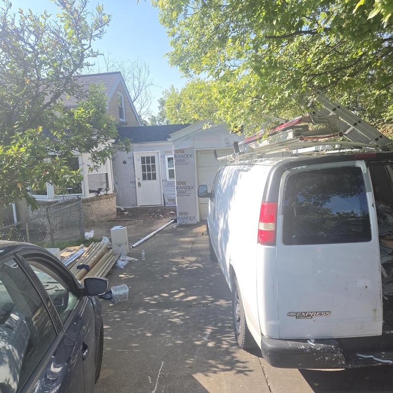 Window and garage door wraps with siding materials Window and garage door wraps with siding materials