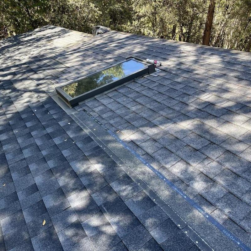 GAF asphalt shingle roof with skylight installation
