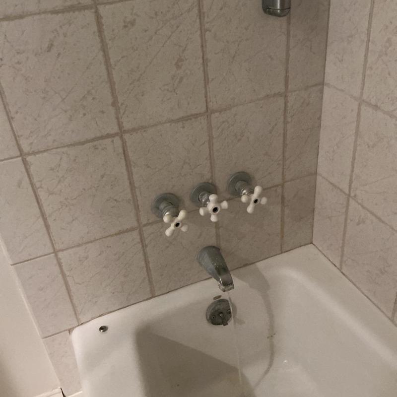Shower valve and tub faucet with ceramic tile wall Shower valve and tub faucet with ceramic tile wall