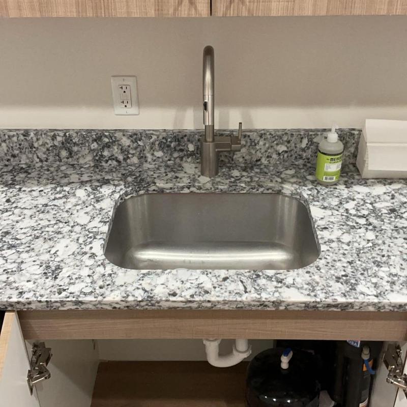 Kitchen sink with faucet and plumbing connections Kitchen sink with faucet and plumbing connections
