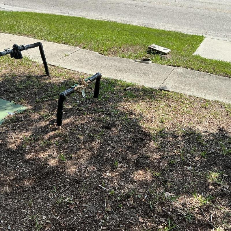 34-inch backflow preventer with plumbing connections outdoors 34-inch backflow preventer with plumbing connections outdoors