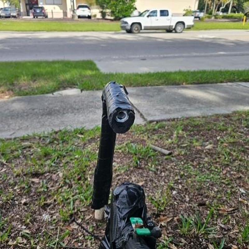 Irrigation valve wrapped with black tape outdoors Irrigation valve wrapped with black tape outdoors