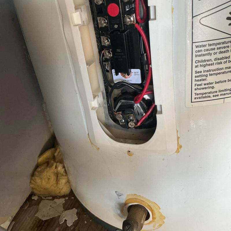 Water heater thermostat and element with wiring exposed Water heater thermostat and element with wiring exposed
