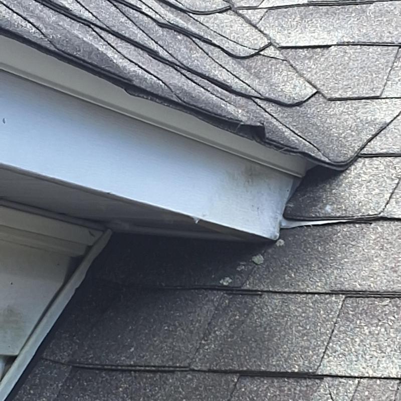 Roof shingles and flashing near dormer edge Roof shingles and flashing near dormer edge