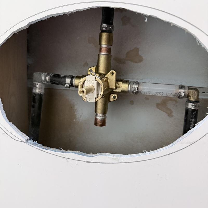 Shower valve and connected plumbing pipes installation Shower valve and connected plumbing pipes installation