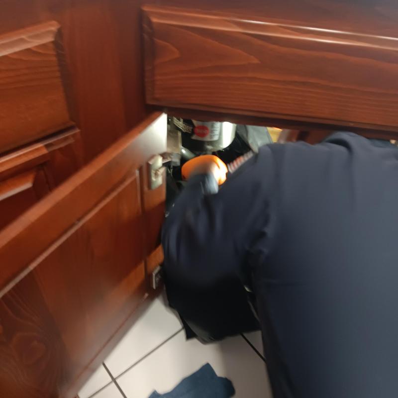 Garbage disposal installation under kitchen sink Garbage disposal installation under kitchen sink