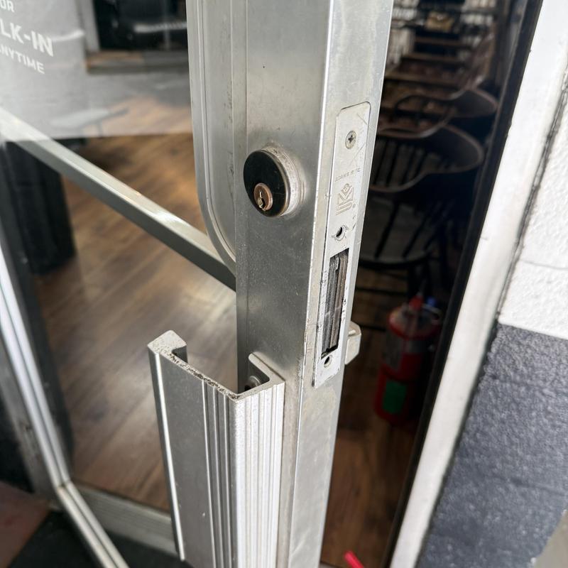 Storefront door lock rekey on barbershop door Storefront door lock rekey on barbershop door