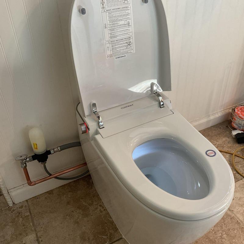 Smart bidet toilet installation with water supply connection Smart bidet toilet installation with water supply connection