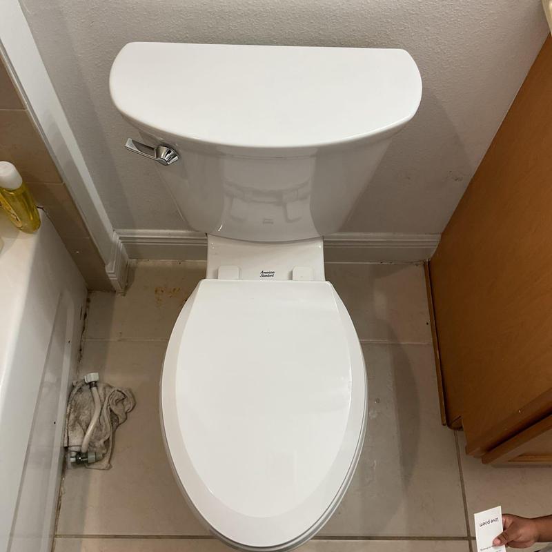 American Standard toilet installation in bathroom corner American Standard toilet installation in bathroom corner