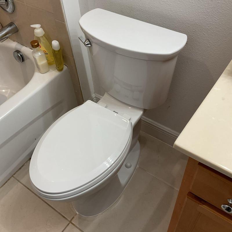 American Standard toilet installed in bathroom corner American Standard toilet installed in bathroom corner