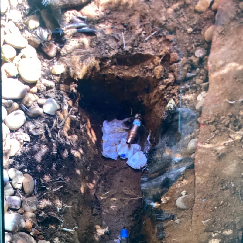 Pressure reducing valve in dug trench with pipe adapters Pressure reducing valve in dug trench with pipe adapters