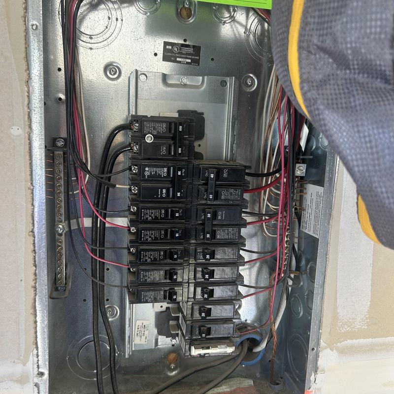 Electrical panel with multiple circuit breakers and wiring Electrical panel with multiple circuit breakers and wiring