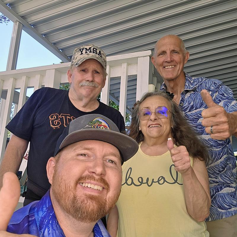 shower drain and hose bib installation group selfie