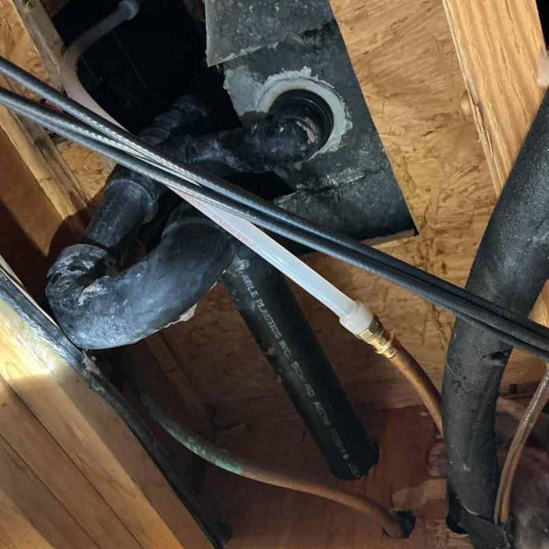 Copper pipe section below master bathroom shower Copper pipe section below master bathroom shower
