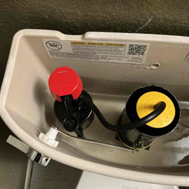Toilet fill valve and flush valve inside tank Toilet fill valve and flush valve inside tank