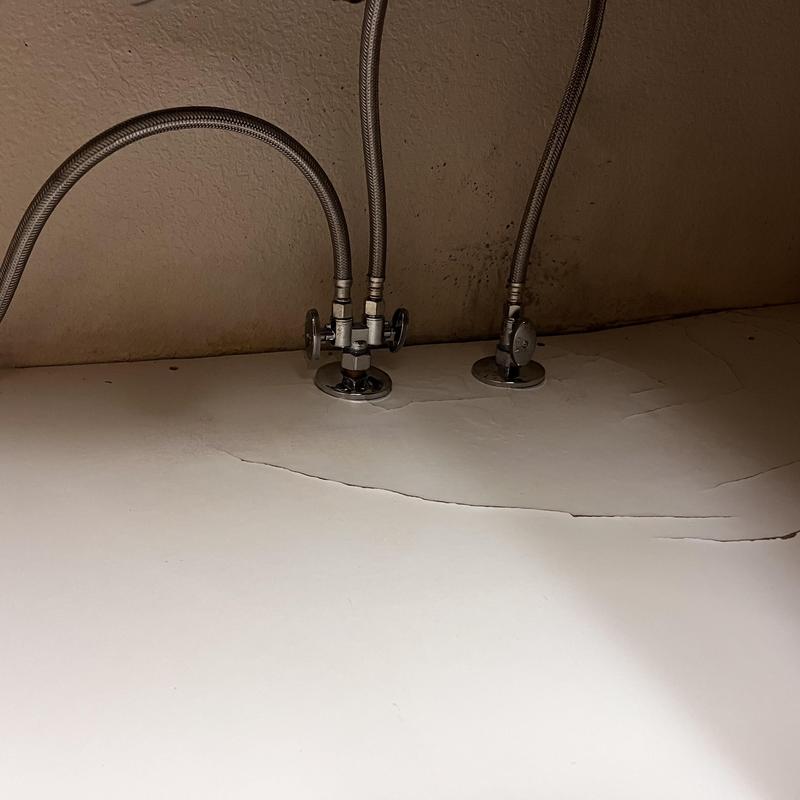 Angle stop valves with supply lines under sink Angle stop valves with supply lines under sink
