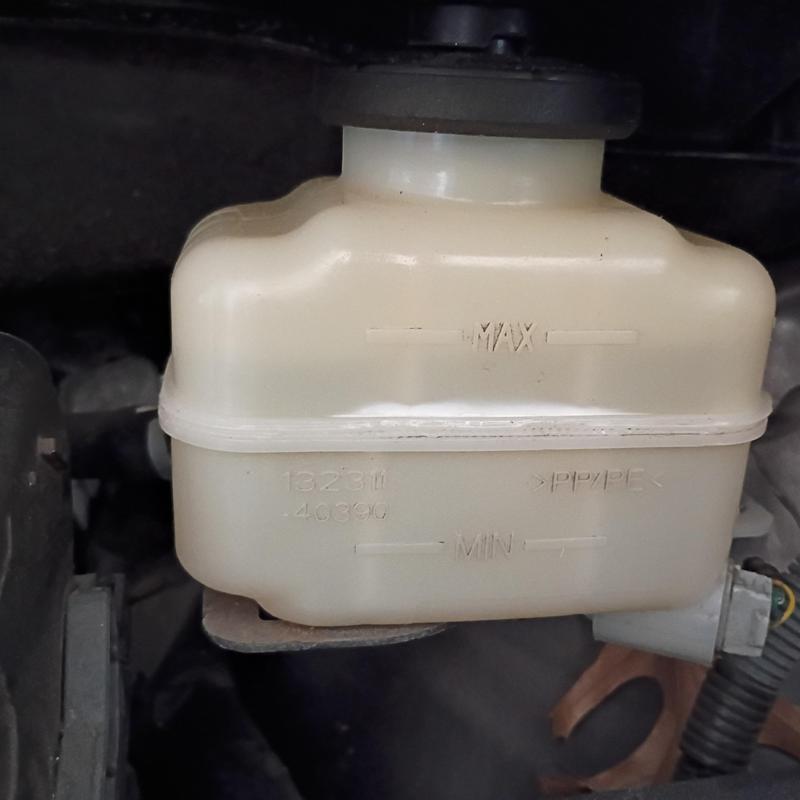 Brake master cylinder fluid reservoir in engine bay Brake master cylinder fluid reservoir in engine bay