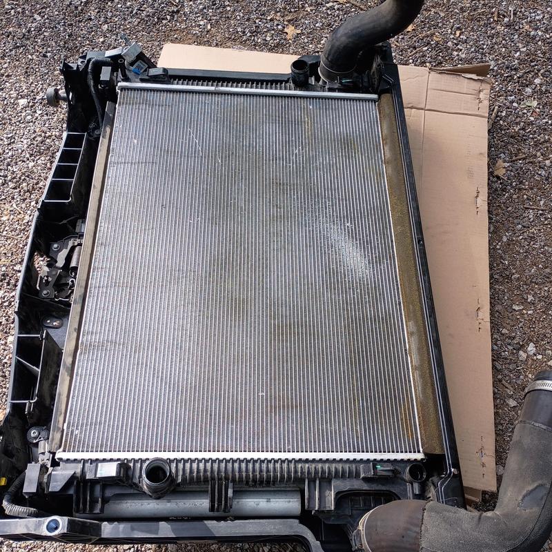 Ford Bronco radiator with attached coolant hoses Ford Bronco radiator with attached coolant hoses