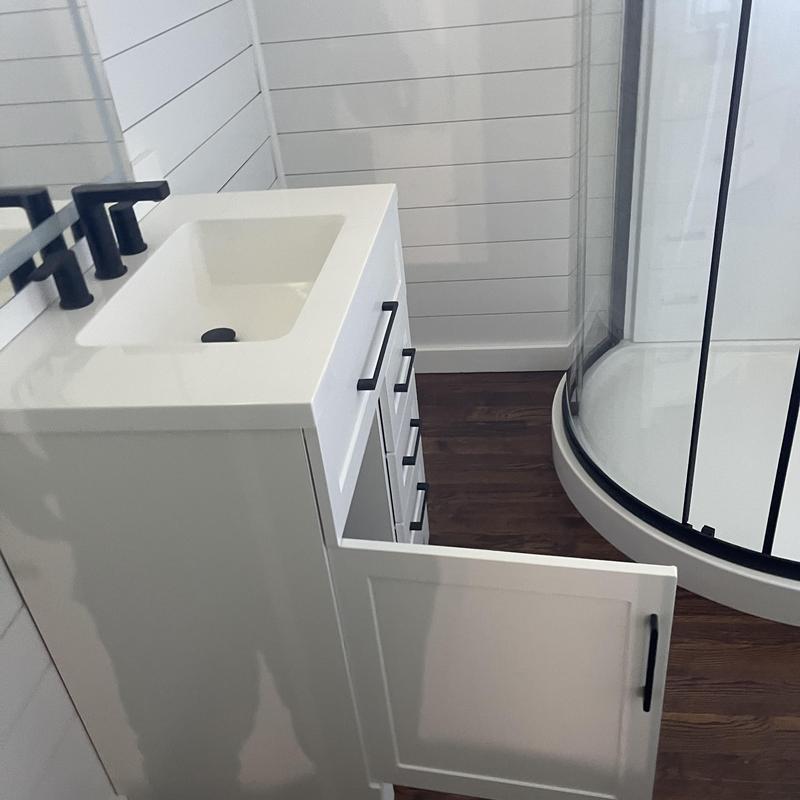 Bathroom sink vanity with matte black faucet and shower Bathroom sink vanity with matte black faucet and shower