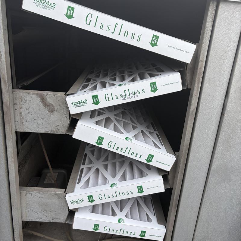 Rooftop air filters stacked for change out Rooftop air filters stacked for change out
