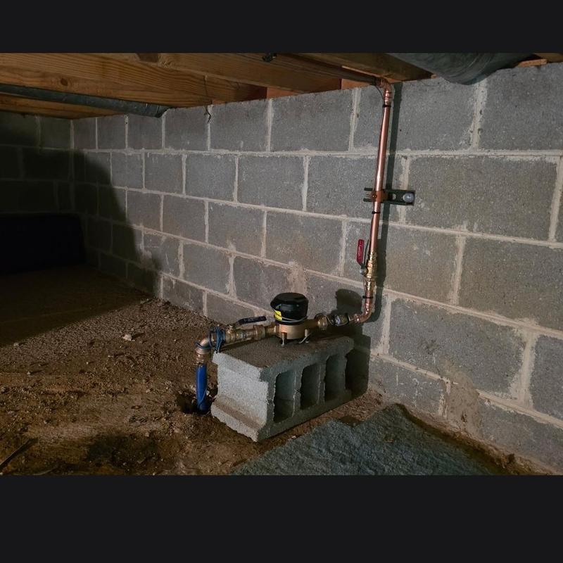 1 inch water service with meter bank installed on block 1 inch water service with meter bank installed on block