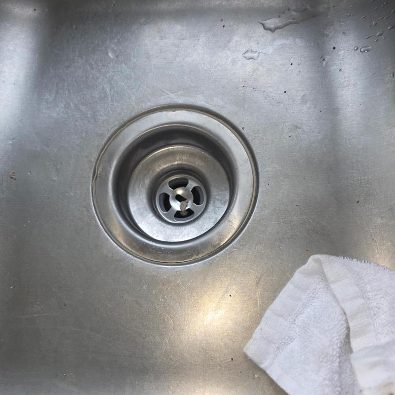Kitchen sink basket strainer replacement with towel nearby Kitchen sink basket strainer replacement with towel nearby