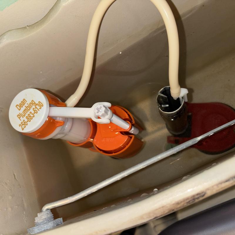 Toilet fill valve and flapper inside tank Toilet fill valve and flapper inside tank