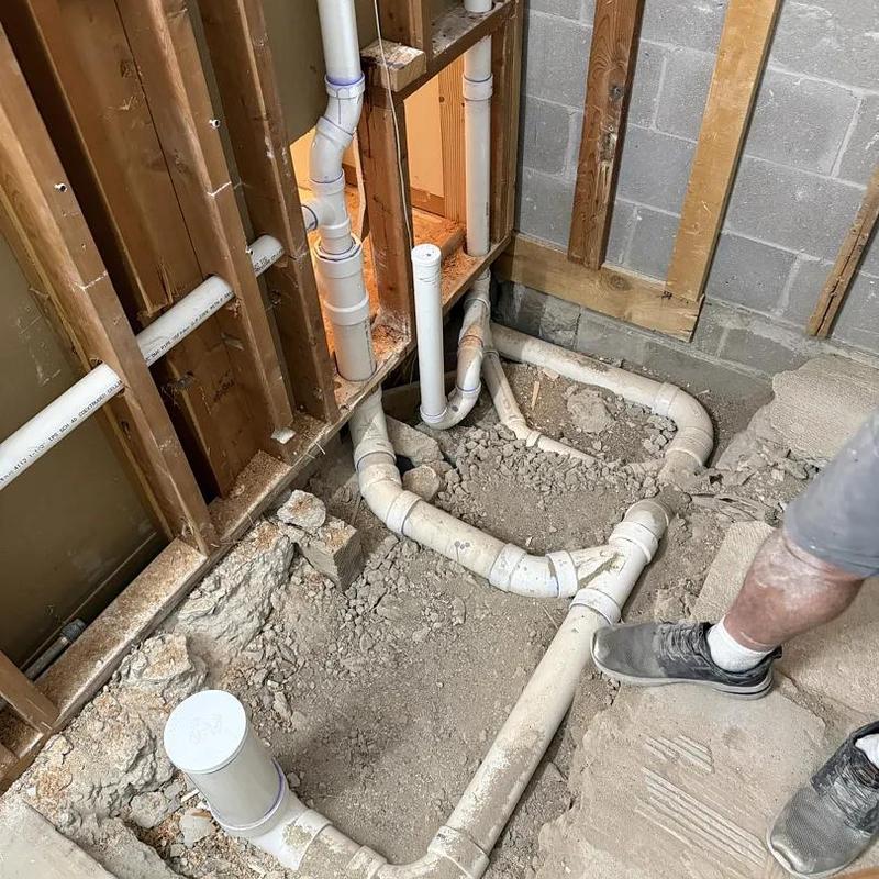 PVC drain plumbing rough-in for kitchen and bathroom remodel