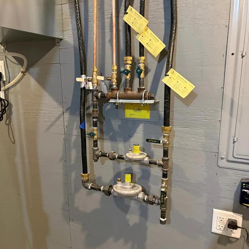 Propane gas regulator and pipe system installation