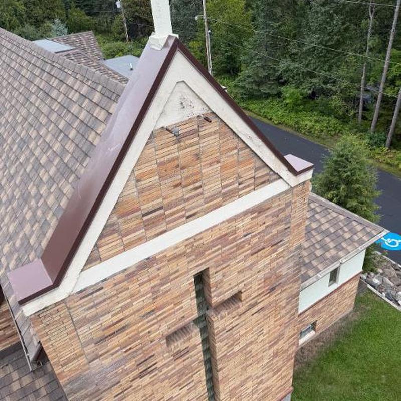 Parapet steel caps on gable ends with fresh paint