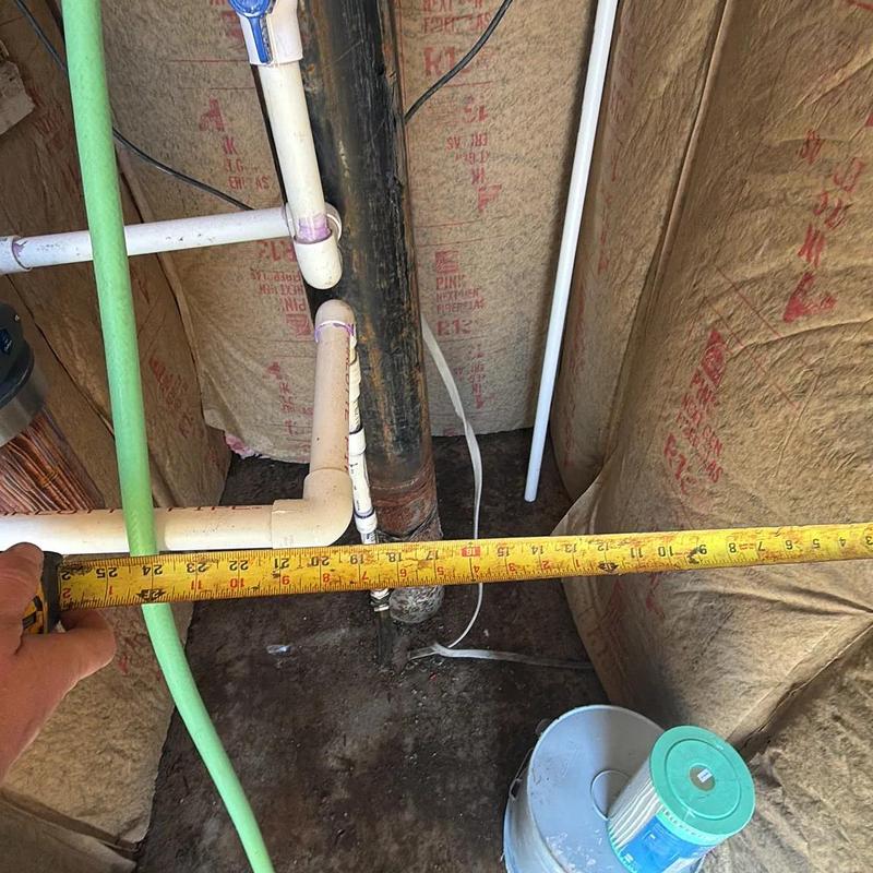 Pump house piping with tape measure and filter nearby Pump house piping with tape measure and filter nearby