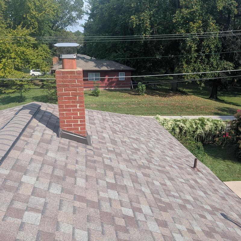 Owens Corning hip and ridge shingles with chimney flashings