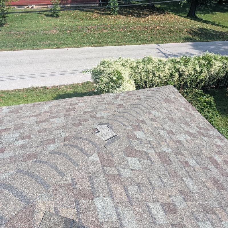 Owens Corning roof shingles with detached section