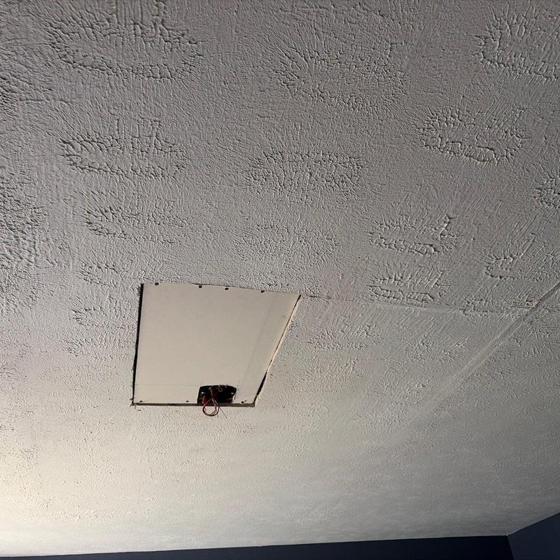 Ceiling drywall patch with exposed wiring hole