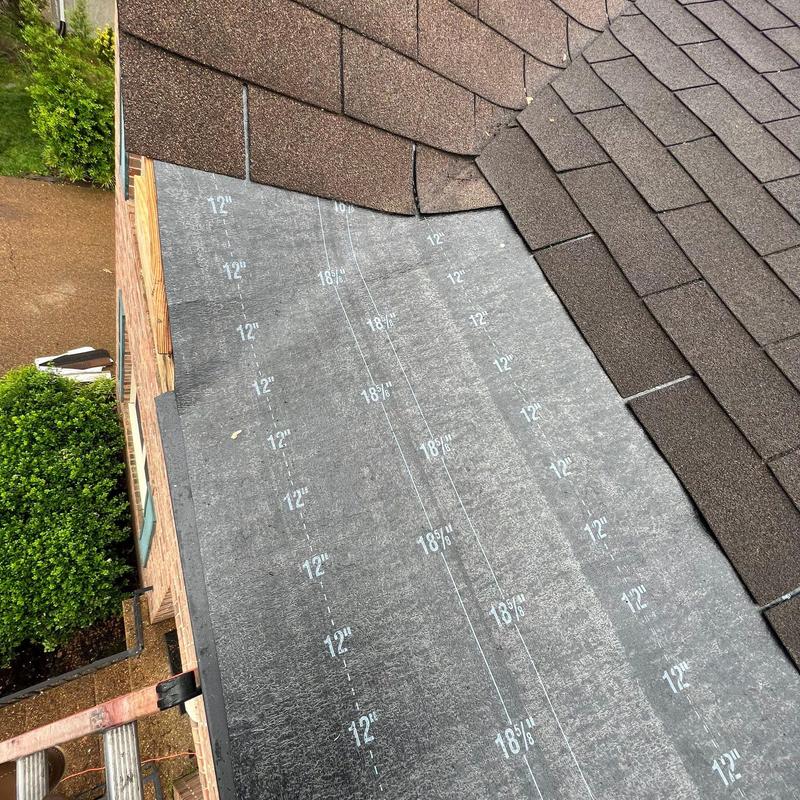 Underlayment installation on roof between shingles